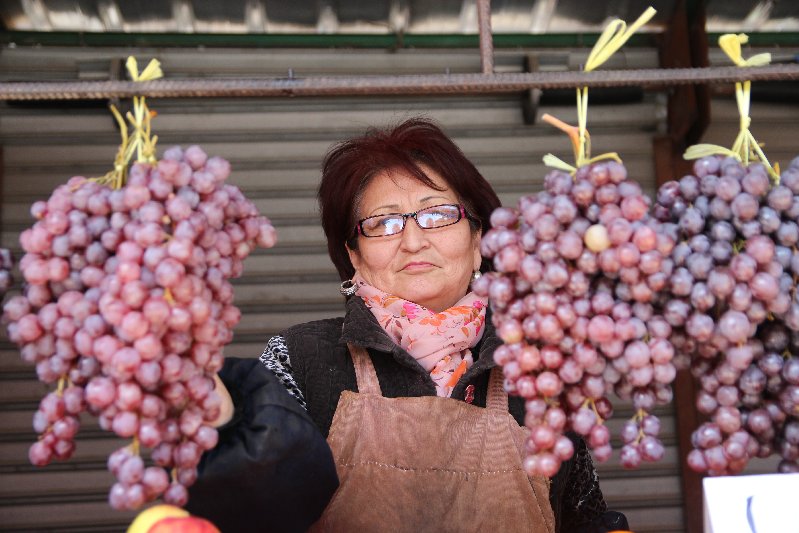 Woman selling Grapes