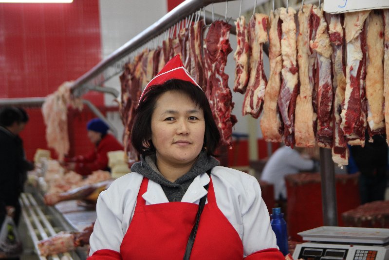 Woman selling Meat