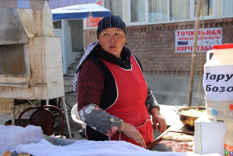 Woman frying Piroshok